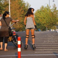 Struggling to get over the bridge on skates, distracted by gnomes.