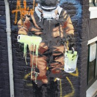 Bustart random street art deep sea diver/painter