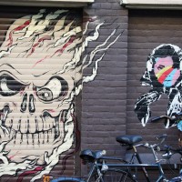 Graffiti on a burned-out hostel