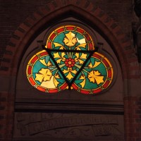 Trifoil leaded glass over a hotel door