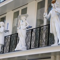 Bell statues on a balcony