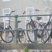 Bikes on the bridge in the winter sun.