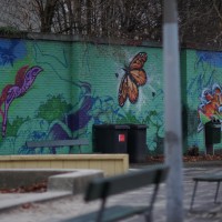 Graffiti on a wall of a playground