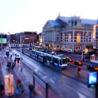 Busy miniature trams on Van Baerlestraat in front of the Concertgebouw