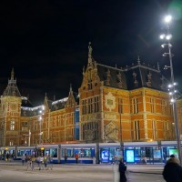 Trams loading and unloading in front of Centraal Station