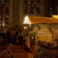 The Occupy movement on the Beursplein next to the Bienkorf