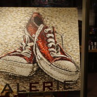 Sneakers in a gallery.