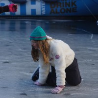 Neighbors skating on the Nieuwe Prinsengracht