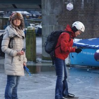 Students skating on the Nieuwe Prinsengracht