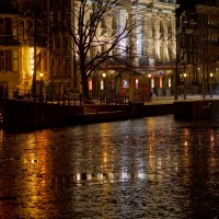 Frozen Amstel in front of the Carré Theatre seen from the Magerebrug