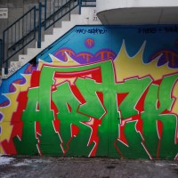 Self-promotion by graffiti artist "Artik" on the wall of the Hell's Angels support shop.