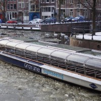 Tour boats gotta get paid, so they continue to plow through the ice.