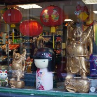 Giant Kimi doll in the window of the Dun Yong Chinese shop