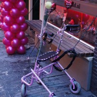 Custom wheels outside a gay bar (Queen's Head) on the Zeedijk (lock it or lose it)