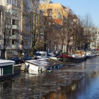 Now it rests on the bottom, one side still attached to the canal wall.