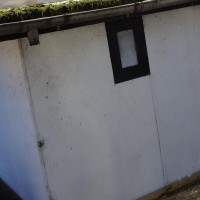 The ice quickly froze again around the submerged house.