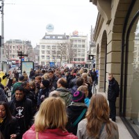 Queue of hundreds waiting for entrance, security has his eye on me.