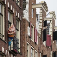 Queens Day loot on an apartment balcony.