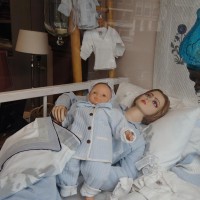 Very creepy store window that looks more like a crime scene.