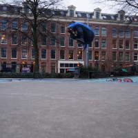 Roller-blader flying out of the skate pool