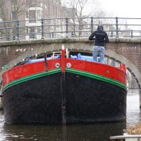 Houseboat ship going to the wharf. Think it will fit?