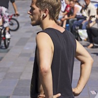 Interesting dude. A camera operator at the street exhibition