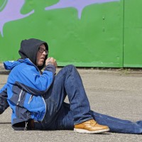 Ben 'EINE" taking a break from painting a huge wall