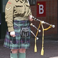 Very serious bag piper.