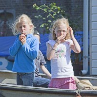 Very cute Dutch kids on a boat
