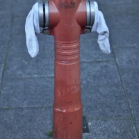 A fire hydrant wearing a pair of socks near the Fire station on Valkenburgerstraat