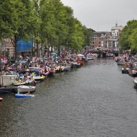 Crowds along the Prinsengracht Canal Parade route.