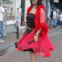 7-foot tall drag queen carefully navigating the cobbled streets