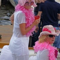 Fabulous ladies watching the parade from their boat